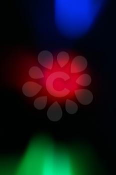Color Bokeh  against a dark background for use at graphic design