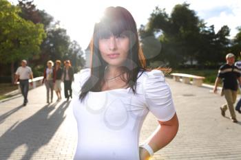 Portrait of young attractive woman at summer