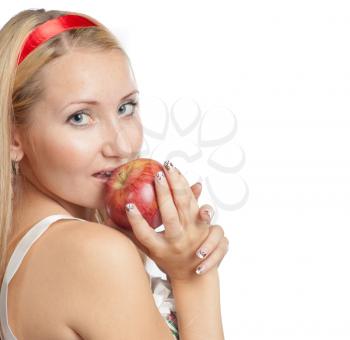 Beautiful blond holding an apple in hands health eating concept