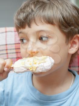 Portrait of a boy with ice cream Indoors