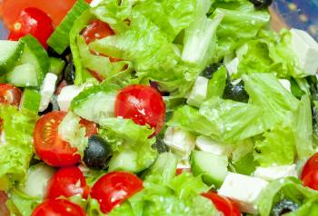shot of raw vegetable salad macro