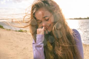 Long haired blonde outdoors head and shoulders