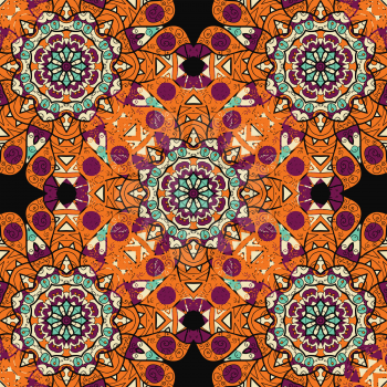 Seamless mandalatiled pattern in orange color over black background. Floral indian vector. Ornate islamic  arabic ottoman indian motif
