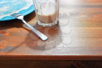 Empty plate and coffee cup and a lot of copy spae on wooden table