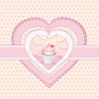 pink cupcake on a heart shaped label with ribbon