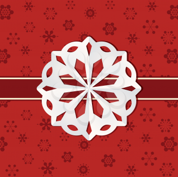 Christmas paper snowflake on a red background with ribbon 