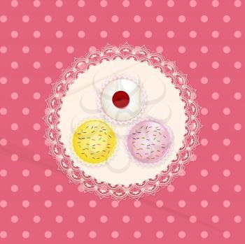 Cupcakes on a White Lace doily against a Pink Polka Dot Background