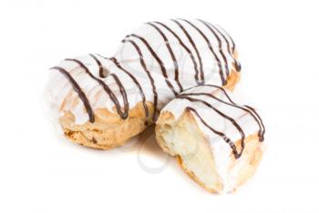 Cream eclairs isolated on a white background