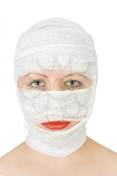 Royalty Free Photo of a Woman With Bandages on Her Face