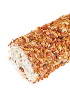 Royalty Free Photo of Nuts on a Swiss Roll