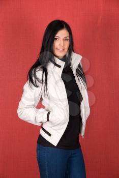 Royalty Free Photo of a Woman Wearing a White Jacket 