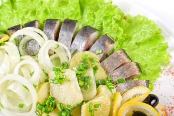 Royalty Free Photo of Herring With Potato and Vegetables