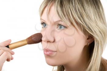 Royalty Free Photo of a Woman Applying Makeup 