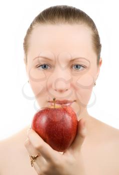 Royalty Free Photo of a Woman Holding an Apple
