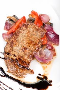 Royalty Free Photo of a Grilled Steak and Vegetables