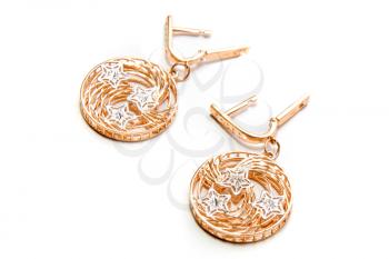 Luxury gold earring isolated on a white background