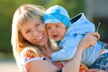 Royalty Free Photo of a Mother Holding Her Son