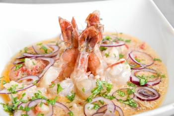 Royalty Free Photo of King Shrimps With Vegetables in Cream Sauce