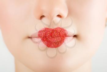 Royalty Free Photo of Heart Shaped Strawberry Lipstick