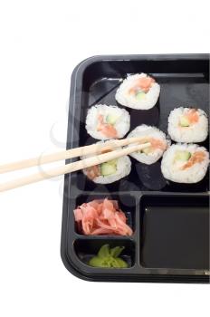 Royalty Free Photo of Rolls of Sushi and Chopsticks