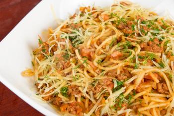 Pasta with meat and greens closeup tasty dish