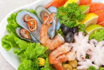 appetizer closeup of different seafood and vegetables