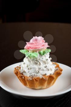 fresh baked cupcake on a wooden table