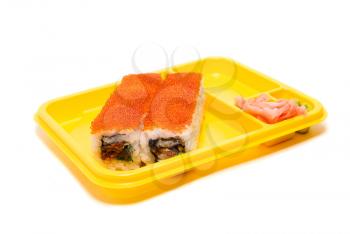 Yellow plate with rolls of sushi on white background