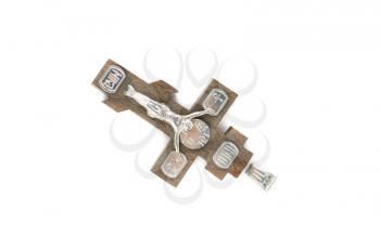 silver and wooden cross with religious inscriptions isolated on a white