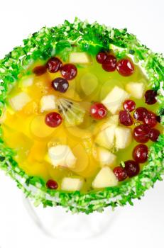 fruit jelly dessert with apple, kiwi, berry and orange