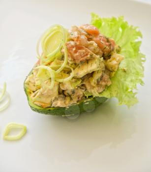 Fresh salad with shrimps, salmon and avocado