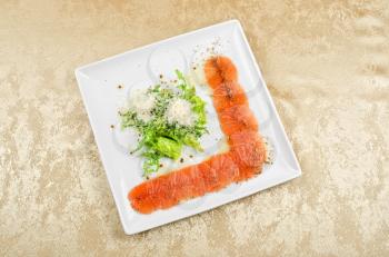 Fish Carpaccio with salad and mozzarella