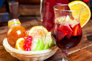 Mulled wine with oranges, apple, honey and berry.