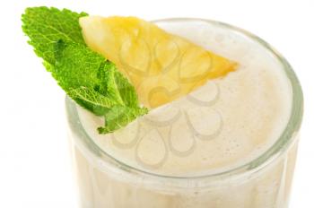 pineapple milk cocktail on a white