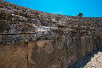 Roman amphitheatre in the ruins of Hierapolis, in Pamukkale, near modern turkey city Denizli, Turkey.
