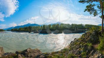 Fast mountain river Katun in Altay, Siberia, Russia. A popular tourist place called the Dragon's Teeth