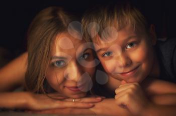 Close up of a portrait boy with his mother