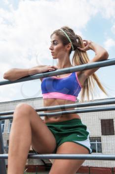 A young beauty athletic woman in sportswear