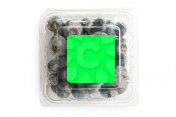 Blueberry in plastic bag isolated on a white background with green chromakey instead of a label