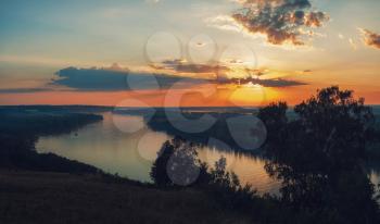 View of river landscape in sunny summer evening. Siberian Ob river in summer sunset.