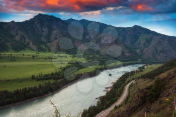 Aerial view of Katun river, in Altai mountains, in beauty summer evening, drone shot