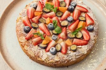 Sweet summer bright cakes with fruit and berries