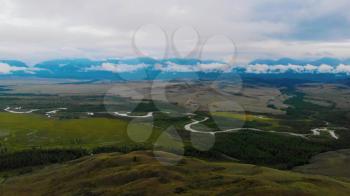 Aerial video over river Chuya in the Kurai steppe between the Kurai and the North Chuia Ranges in the south-eastern Altai, Siberia, Russia