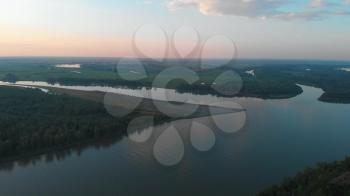 Aerial view of big siberian Ob river in beauty summer evening, 4K drone footage.
