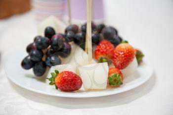 Catering service. Tasty fruit appetizers on the table