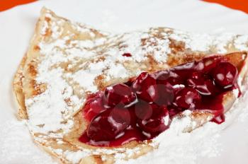 pancakes with sweet cherry sauce