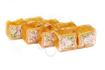 pancake sushi rolls with cream cheese, cucumber and meat isolated on white