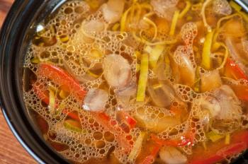 Fresh vegetable soup made of mushrooms, pepper and onion