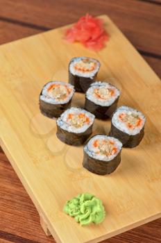 Japanese cuisine - sushi rolls with tobico and pancake