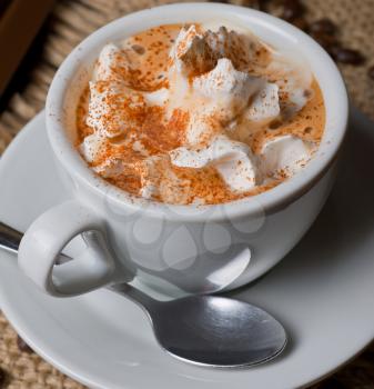 Closeup image of coffee with whipped cream